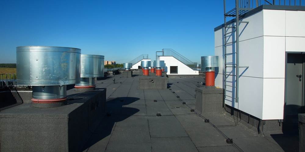 roof of the building with ventilation hatchways, air conditioning, antennas, electricity