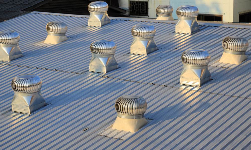 ventilators on the roof top spinning and take cool air into the building